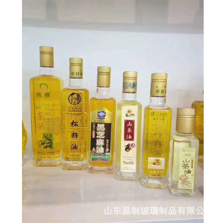 批发供应大量山茶油食用油玻璃瓶多规格喷涂烤花瓶晶白料透明瓶