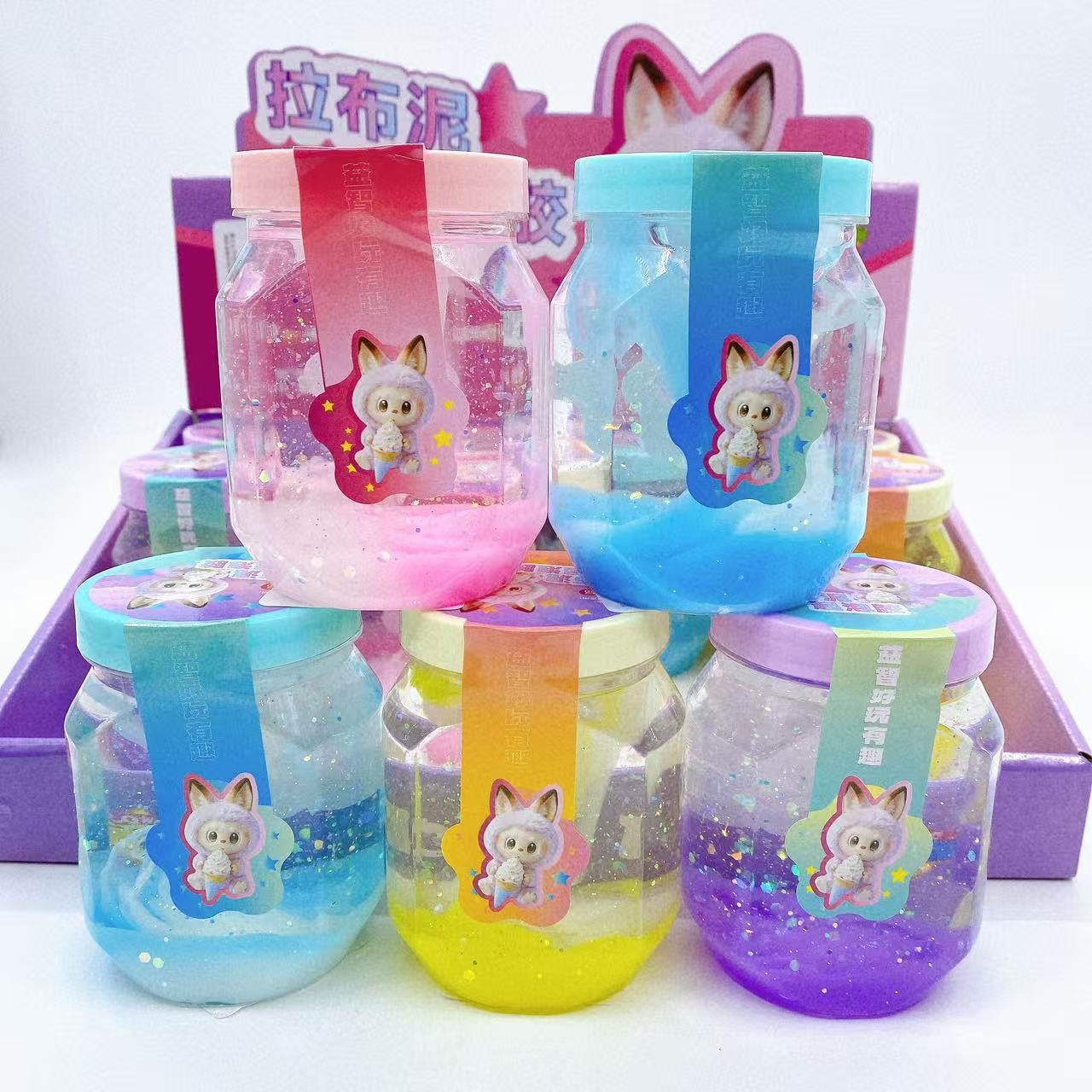 Lodo de dibujos animados de lápido colorido transparente de alta transparencia precio de subida Slime DIY hecho a mano material descomprimido lote de juguetes