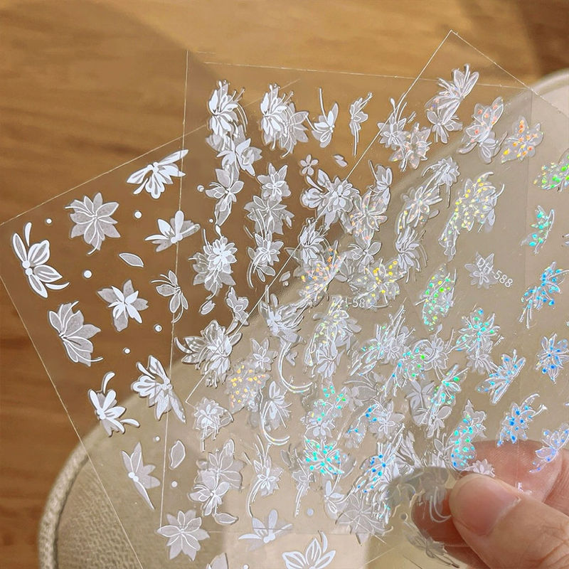 Net red snow mowing nail stickers colorful laser temperament nail stickers adhesive nail decals white semi-transparent flower Net red snow mowing nail stickers colorful laser temperament nail stickers adhesive nail decals white semi-transparent flower