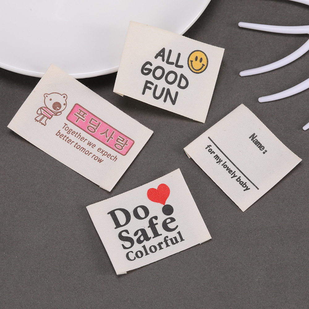 厂家现货商标纯棉水洗标服饰玩具背包装饰标服装围巾帽子布标辅料