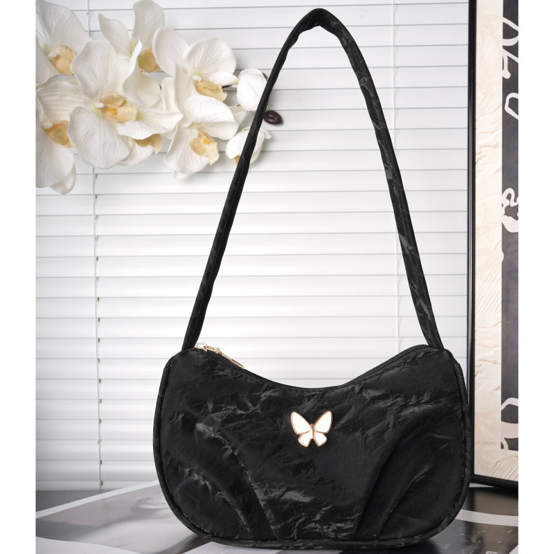 Bolsa de mariposa para mujeres 2025 verano nuevo estilo diario simple con casualidad de color sólido de hombro plegado en la parte inferior de la camisa