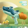 Blue cartoon shark, water gun
