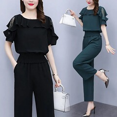 ネットの赤い太ったmmのデザイン感の洋気の高いスーツの大きいサイズの婦人服の夏の新型は腰を収めてやせている2つのセットを現します。