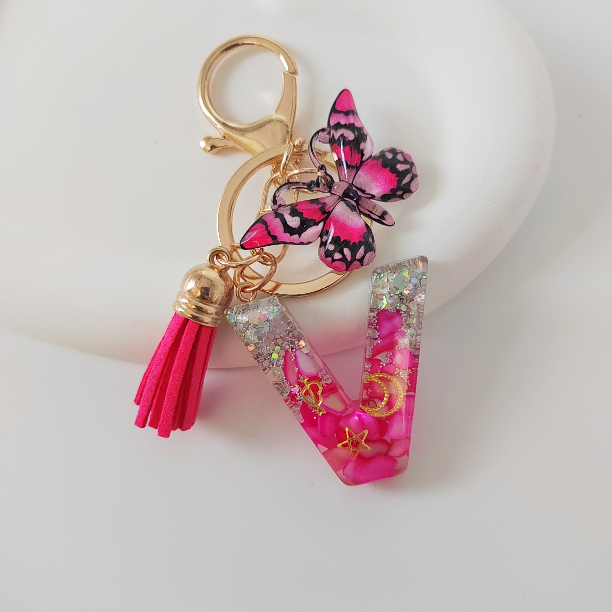 Inventario transfronterizo nueva resina bicolor mariposa borda llavero colgante estrella luna accesorios de joyas