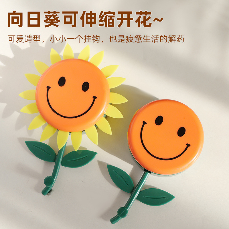 ひまわり格納式フック スマイリーフェイス 高価値 家庭用ひまわり開花フック パンチフリー粘着フック シームレスステッカー|undefined