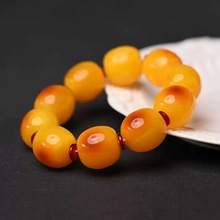 厂家直供俏色琥珀血珀隔片桶珠男女款圆珠手链原石蜜蜡手串