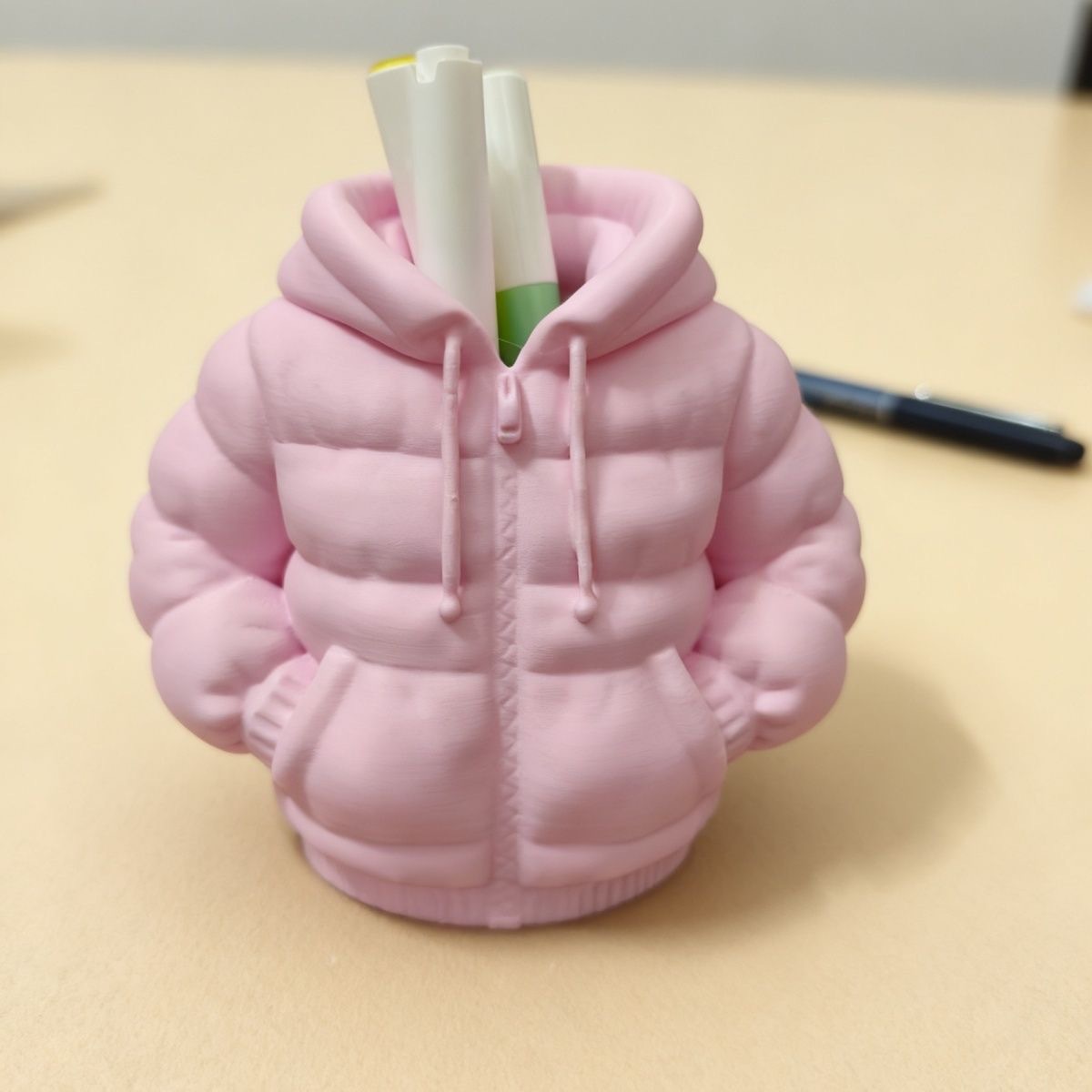 Fuchsia down jacket, pens holder