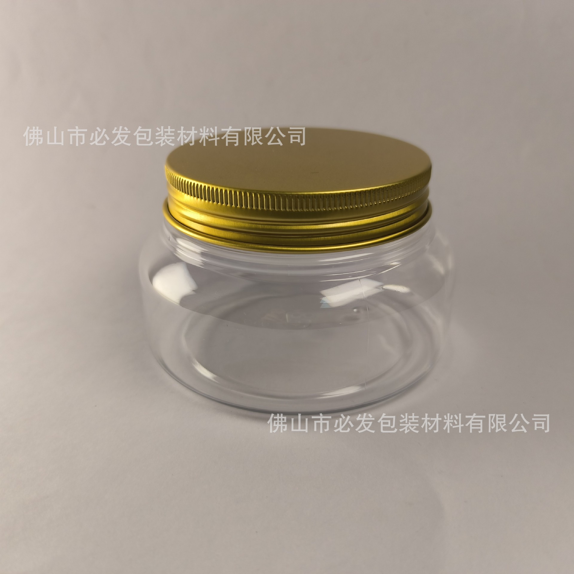 200g; Botella transparente de 200g + tapa de aluminio dorada; mascota