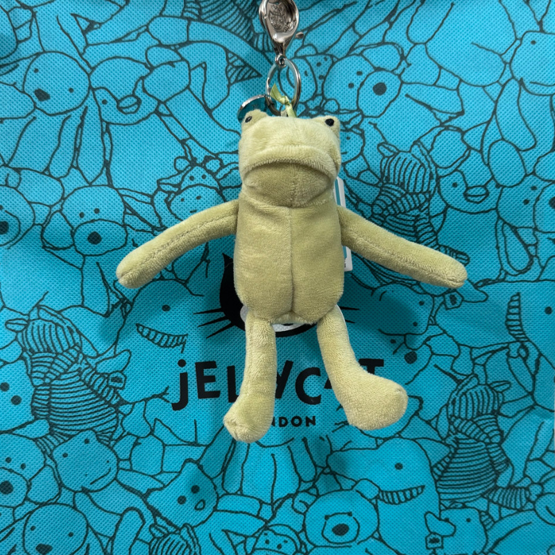 Sad frog charm