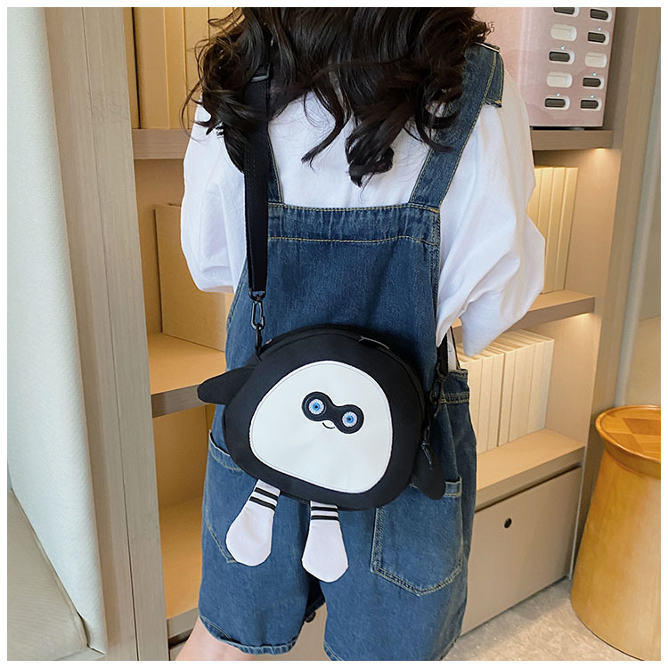 The new 2024 children's egg-shaped party backpack is a cute cartoon canvas single-shoulder bag and a fashionable and stylish small backpack undefined