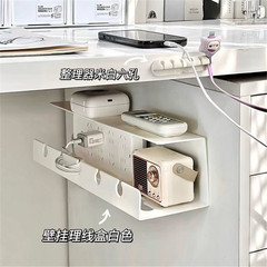 机の下の理線器の収納棚は穴を開けないでください。