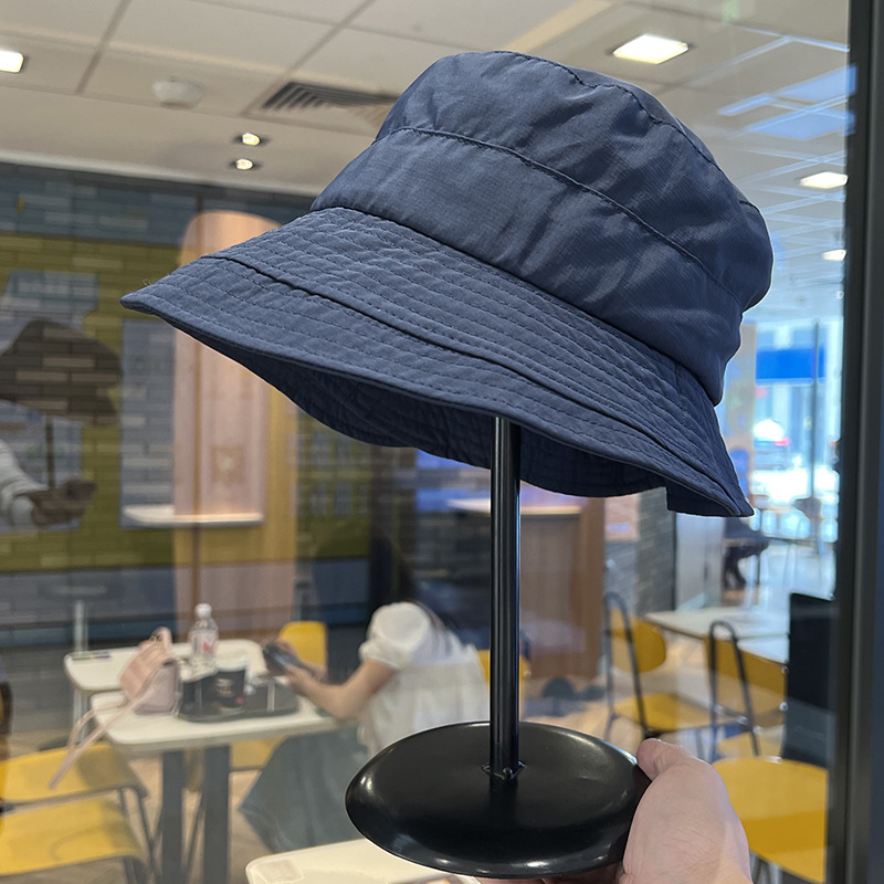 Sombrero de pescador de protección solar para mujeres 2024 nuevo estilo de estilo de moda con bordes anchos y una parte superior plana, sombrero de sol casual universal