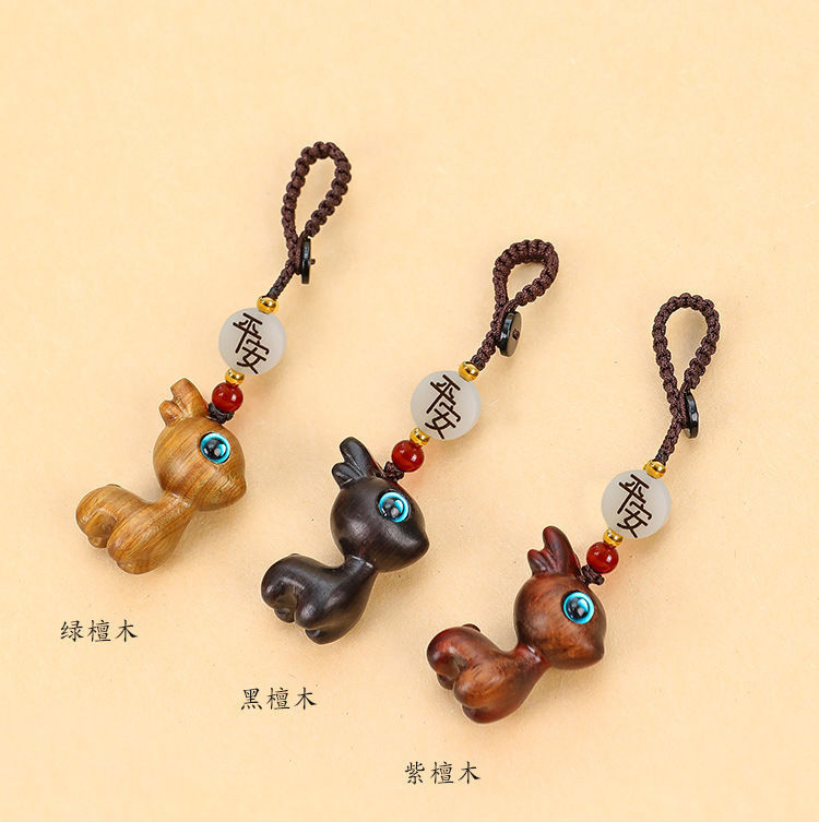 A deer car key chain pendant sandalwood deer buckle key car decoration deer couple pendant