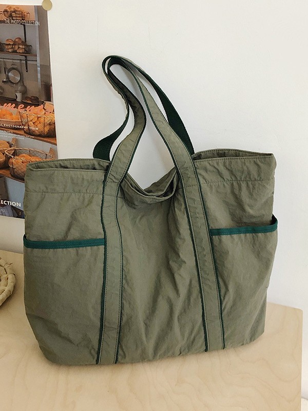 Bolsa de mano de tela de nylon de gran capacidad para mujeres 2026 nueva simple, ligera y versátil bolso de hombro de viaje diario