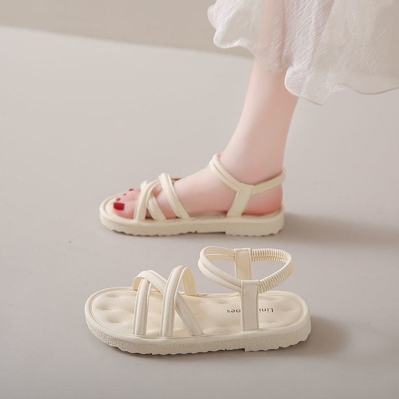 Estilo de hadas cómodas sandalias planas suaves para mujer 2025 verano nuevo estilo casual punta abierta zapatos de playa suaves zapatos de mujer