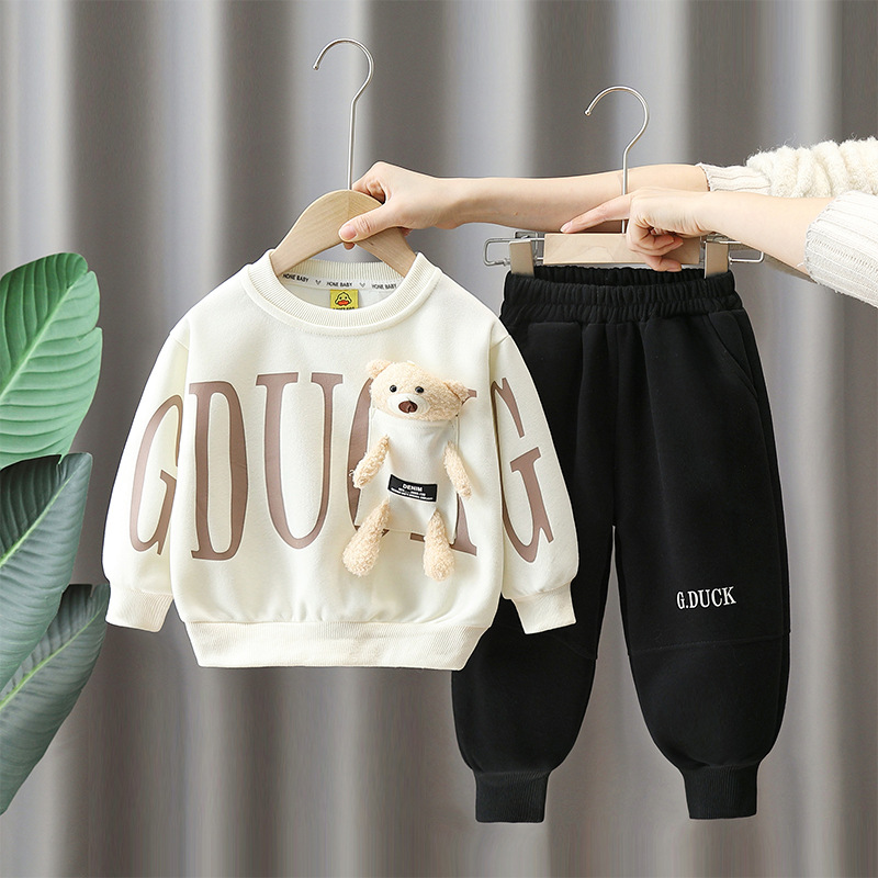 6151 Little Yellow Duck Boy Traje de otoño 2025 Nuevo estilo estilo occidental Suéter de bebé Traje de dos piezas de primavera y otoño para niños