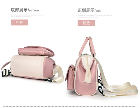 The Mommy bag is small and cute. It has a detachable front pocket and is a multi-functional baby bag. It is waterproof, lightweight, and has a crossbody design. It can be used to carry milk bags undefined