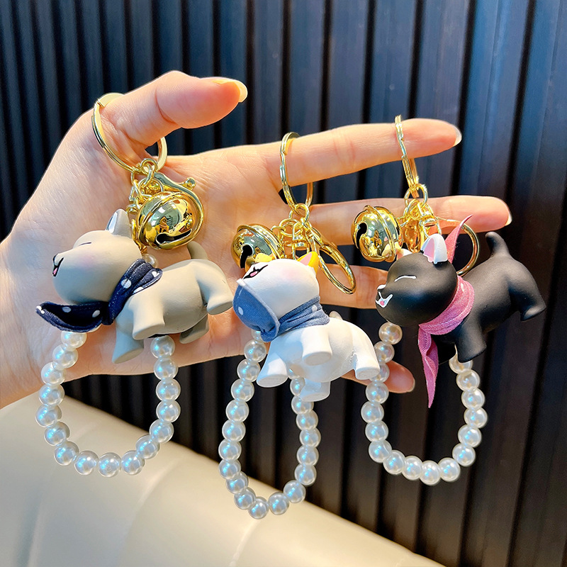 Cadena de perlas resina gato llavero muñeca de dibujos animados llavero colgante bolso colgante colgante máquina de agarre pequeño regalo al por mayor