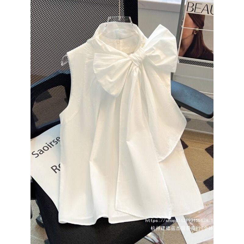 French-style rich lady's white bow sleeveless shirt for women, high-end design, loose-fitting, tummy-covering tank top for summer French-style rich lady's white bow sleeveless shirt for women, high-end design, loose-fitting, tummy-covering tank top for summer