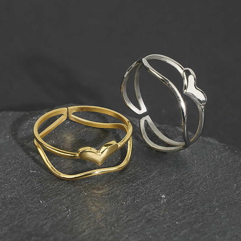 Minimalistic wavy design golden glossy ring heart-shaped stainless…