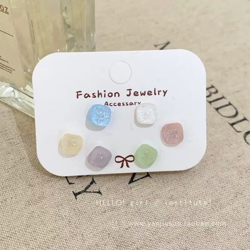 Pendientes redondos de color de aguja de plata Pendientes frescos y dulces Pendientes de todo fósforo de moda simple para mujer