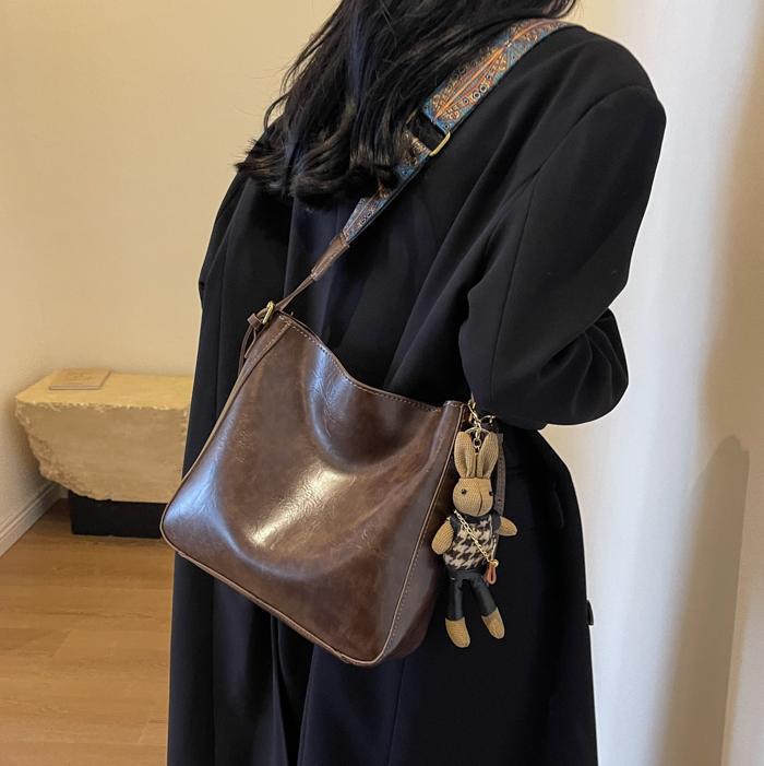 Bolsa casual simple para mujeres 2025 nuevo bolso de cubo universal estilo extranjero de alta calidad bolso de hombro