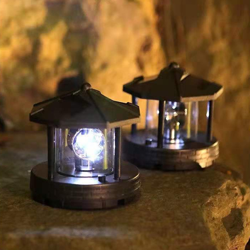 In stock LED lights outdoor solar rotating lighthouse resin accessories garden landscape lights courtyard decorative lights