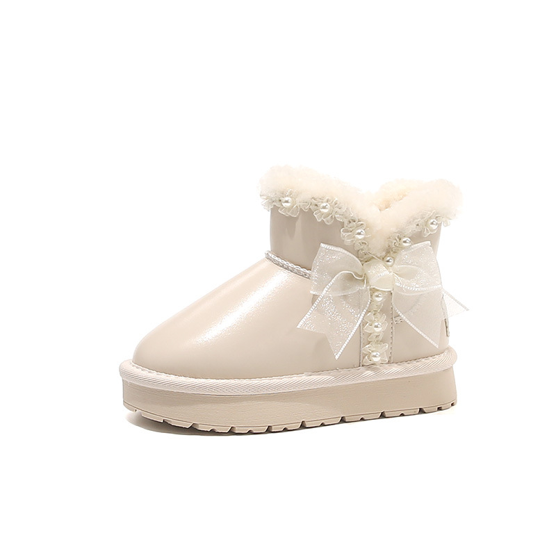 Zapatos de algodón princesa de arco de niñas para niños botas de nieve de lana de invierno 2025 nuevas niñas zapatos de algodón gruesos