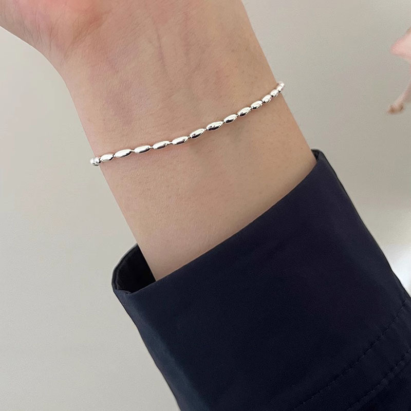 S925 Sterling Silver Rice Olive Bracelet Women's Light Luxury High-end Niche Design Simple All-match Glow Rice Bead Bracelet S925 Sterling Silver Rice Olive Bracelet Women's Light Luxury High-end Niche Design Simple All-match Glow Rice Bead Bracelet