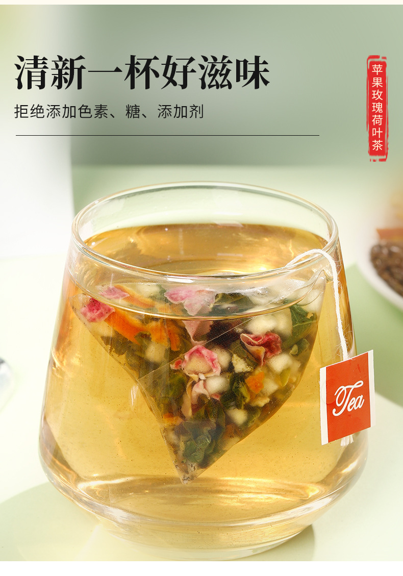 Apple Rose Lotus Leaf Tea (He Ye) — 20 Pyramid Sachets with Cassia Seed & Red Rose in use