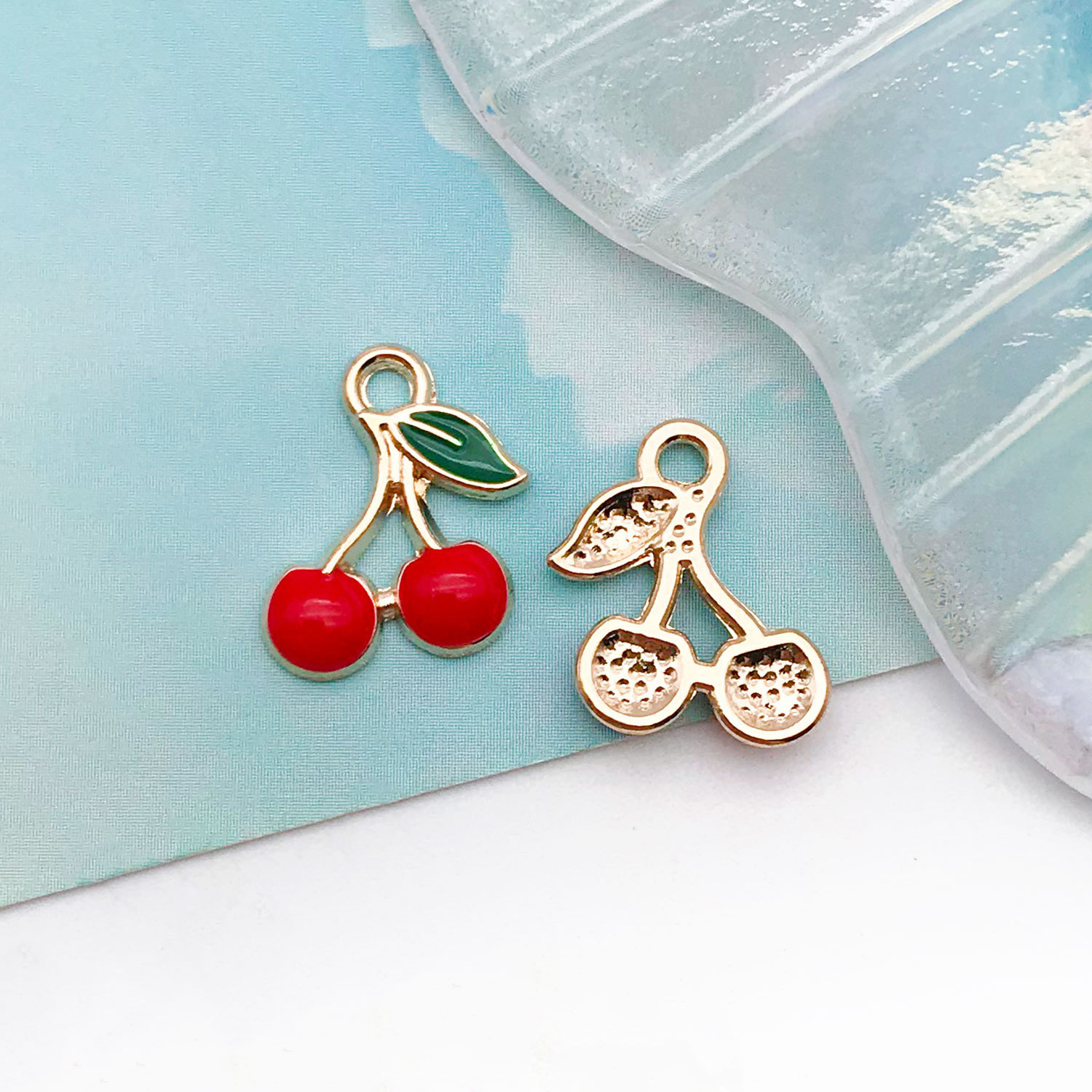 1 fruta de cereza pequeña unilateral con aceite de gota Roja 10x13mm - 11052 - 0,6g