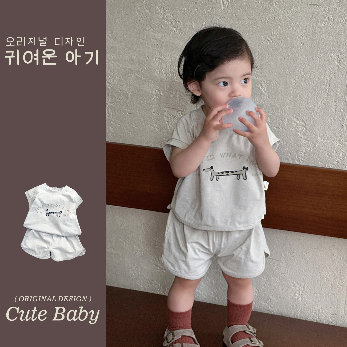 Baby Puppy Print Versión coreana sin mangas de verano recién nacido Pantalones cortos de estilo occidental Baby A Thin Summer Traje de dos piezas