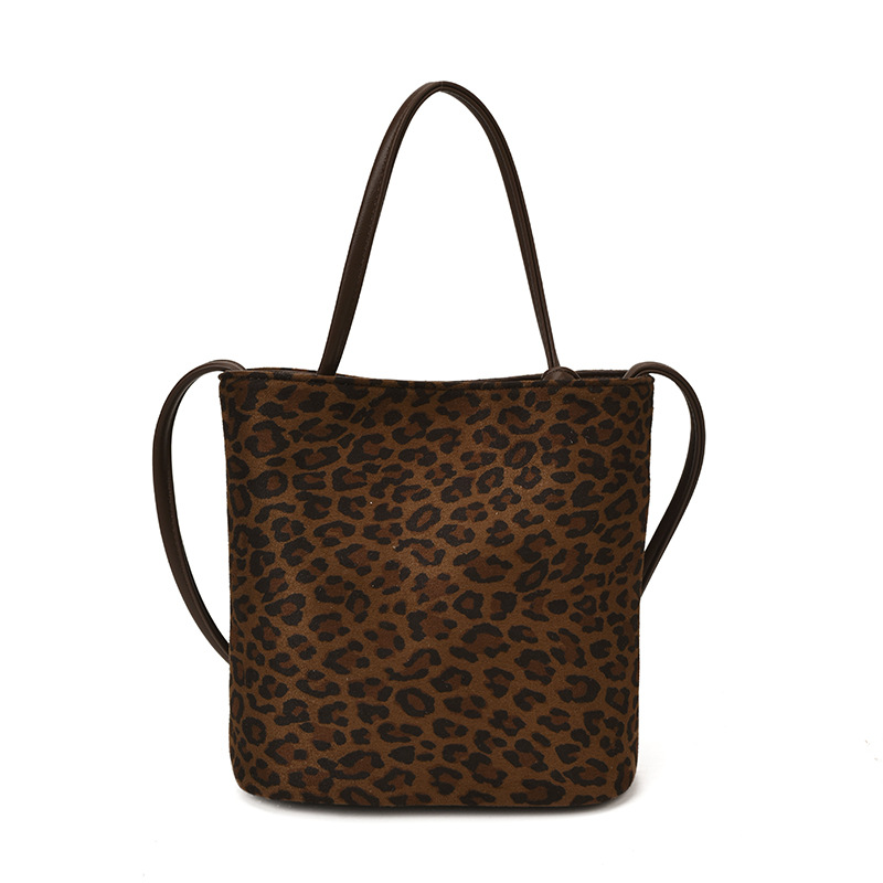 Transfronterizo leopardo bolso 2025, otoño y invierno nuevo bolso de cubo de gran capacidad, bolso de hombro retro de mujer, bolso de transporte