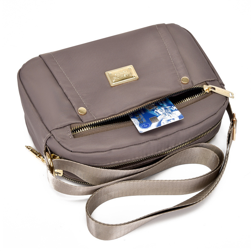 Bolsa de mensajero de tela Oxford para mujer 2023 nueva primavera de mediana edad para mujer bolsa de viaje de gran capacidad hombro nylon madre bolsa todo a juego