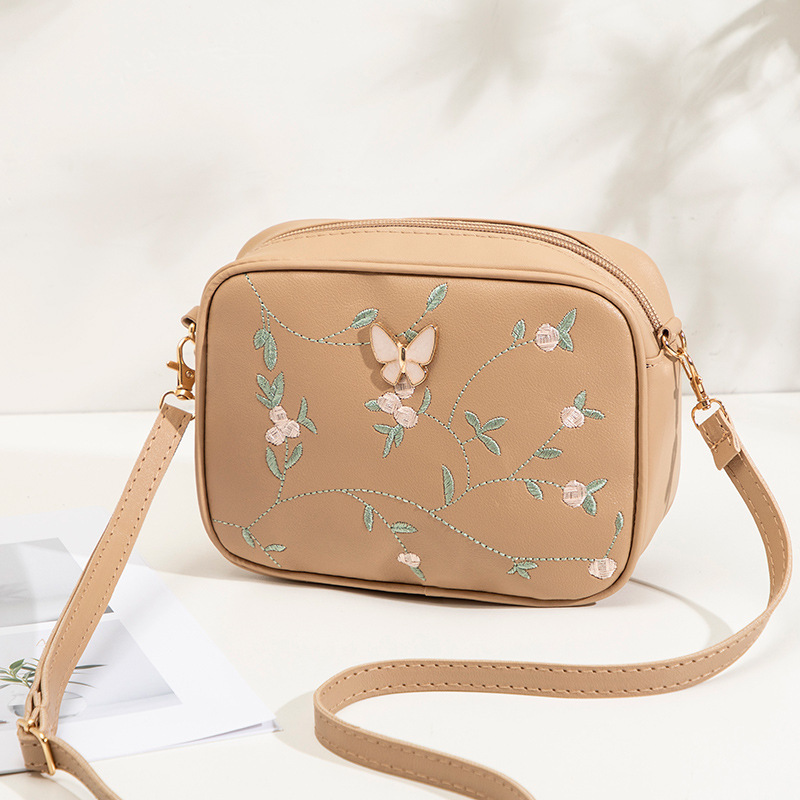 Bolsas de cámara de hombro de moda de mariposa decoración 2024 bolsas de mujer verano y otoño nuevo estilo de personalidad de bolsas de cambio inclinadas