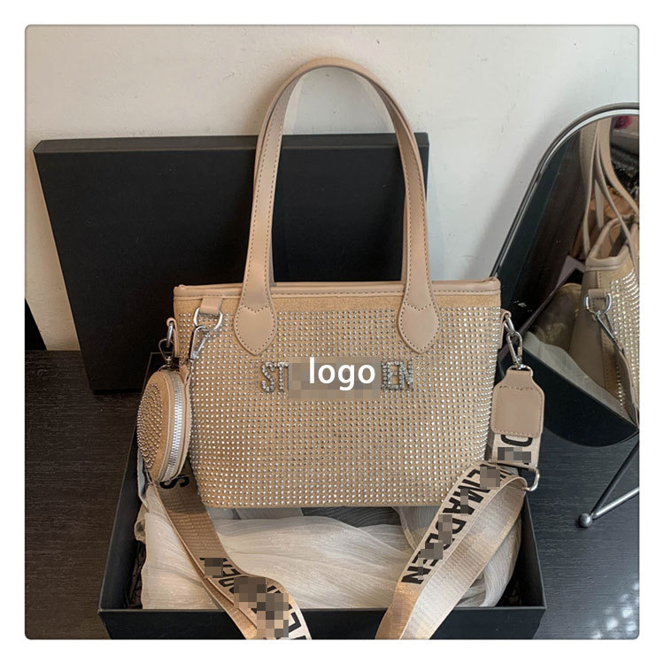 Bolso de letras de diamantes de imitación transfronterizos diseño de nicho femenino moda simple portátil popular 2025 nueva textura bolsa de mensajero