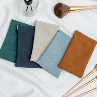 Factory wholesale PU makeup brush perfume lipstick storage bag shrapnel leather bag portable pocket embossed LOGO