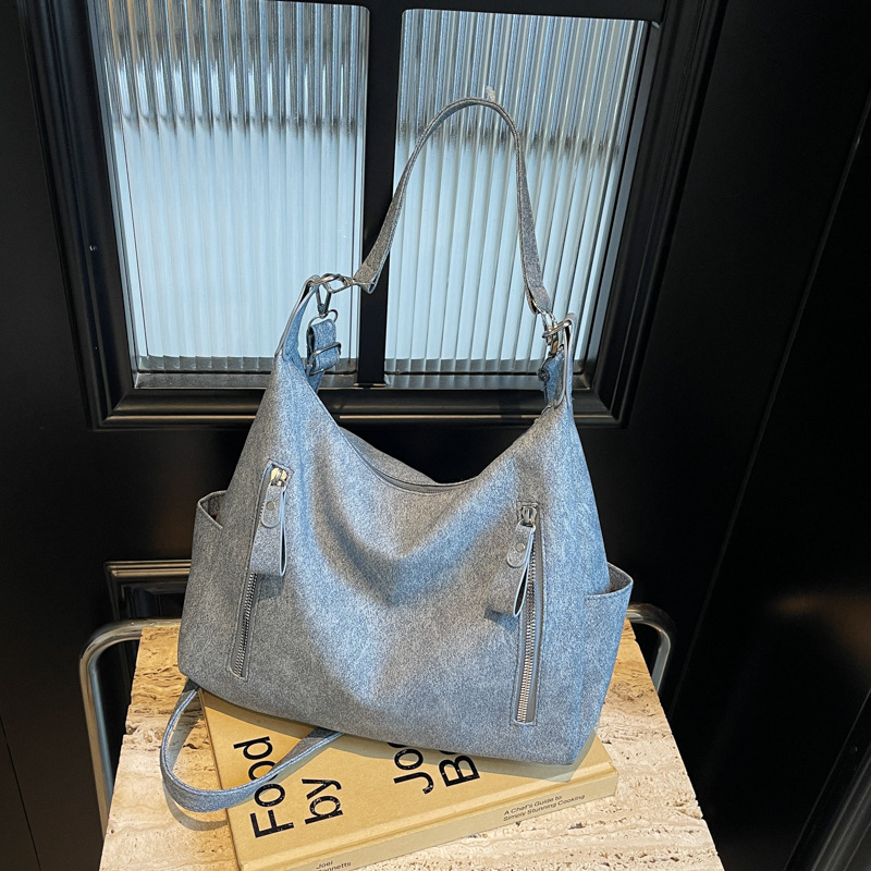 Bolsa de gran capacidad para mujeres 2024 otoño y invierno nuevo mochila mochila de textura esmerizada nicho bolso de hombro para viajar bolso de mujer