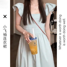 茶歇法式小飞袖吊带连衣裙子女装春夏季2024新款海边度假露背长裙