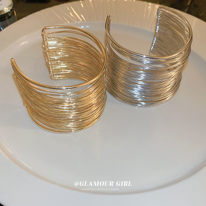 Europeo y americano exagerado multi-capa hueco brazo anillo abierto pulsera nicho creativo diseño sentido pulsera personalizada estilo frío pulsera