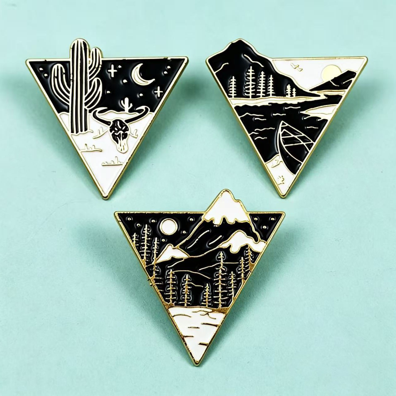 Creativo Xingyue Mountain River Plant Broche Triángulo Geometría Aleación Pin decorativo Medalla Accesorios de vestir Punto transfronterizo