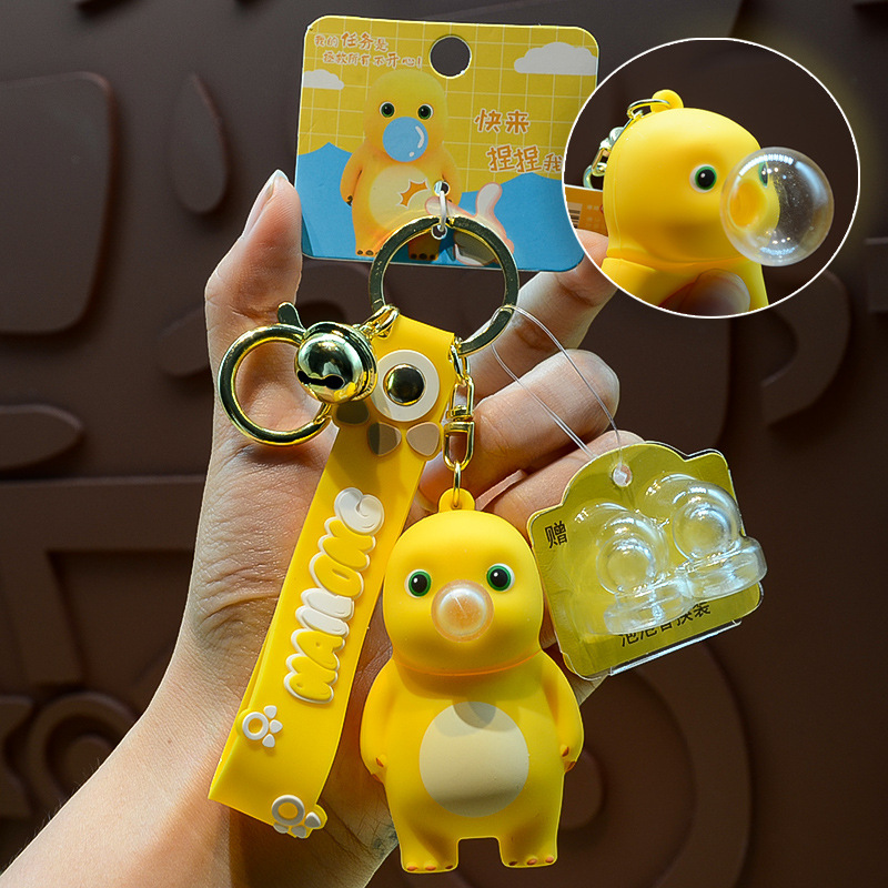 2025 nuevo arrogante pequeño dragón llavero bolso de hombre colgante muñeca joyas pareja llavero para mujeres