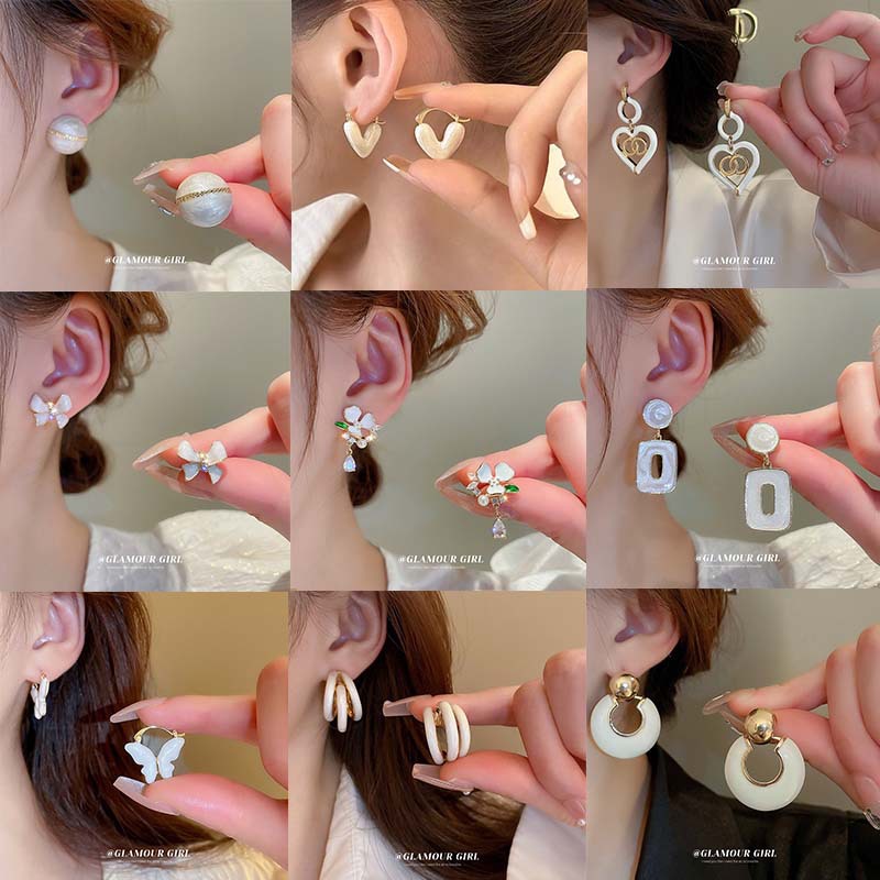 Aguja de plata flor pendientes geométricos pendientes dulces pequeños frescos de Corea del Sur ins moda nicho pendientes