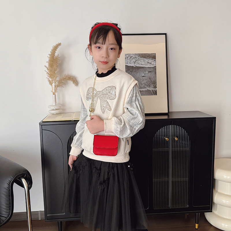 Coreano simple color sólido bolso pequeño para niños y niñas mini lindo bebé mochila 2025 nueva cadena bolso para niños