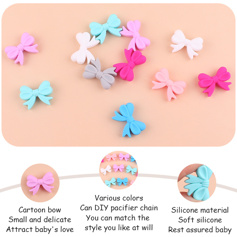 Bebé suministros de dibujos animados de silicona arco pequeño mordedor creativo bebé pezón anti-gota cadena pulsera mordedor Accesorios