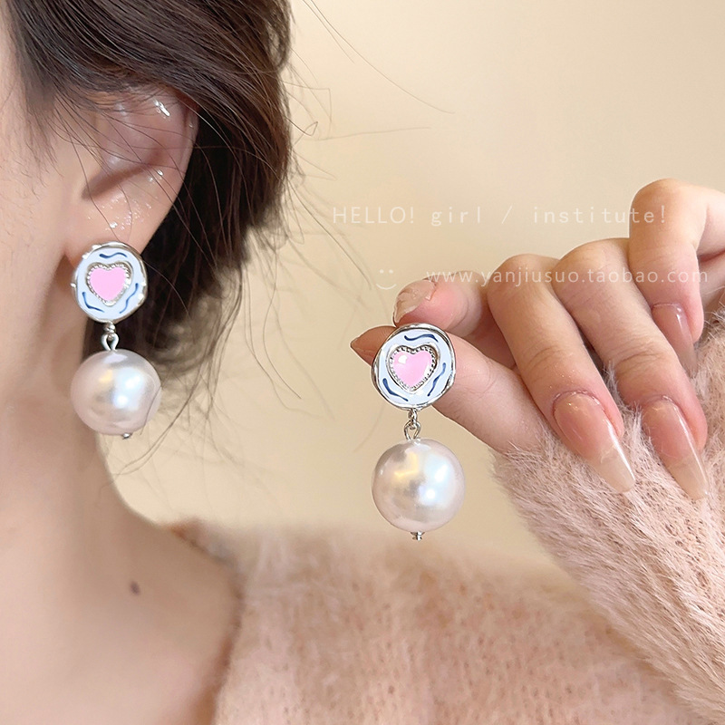 Diseño de nicho de alta gama borla larga sin orejas clip de oreja elegante estilo occidental de las mujeres cara-mirando pequeños nuevos pendientes de moda