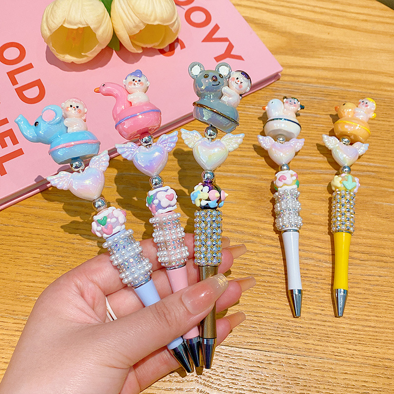Papelería de dibujos animados para niños bolígrafo de bola giratorio personalidad creativo de diamantes hechos a mano bolígrafo de cristal regalo de estudiantes bolígrafo