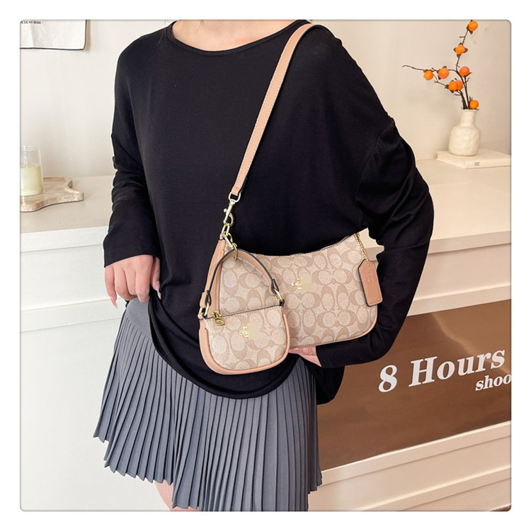 Bolsos nuevos transfronterizos para mujer 2025 moda y todo fósforo de alta gama bolso de axila de un solo hombro bolso de mensajero portátil con estampado clásico