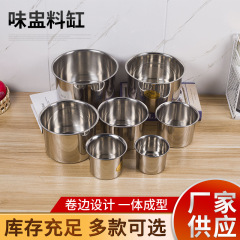 ステンレスの味の杯は蓋の調味料の缶を持っています。