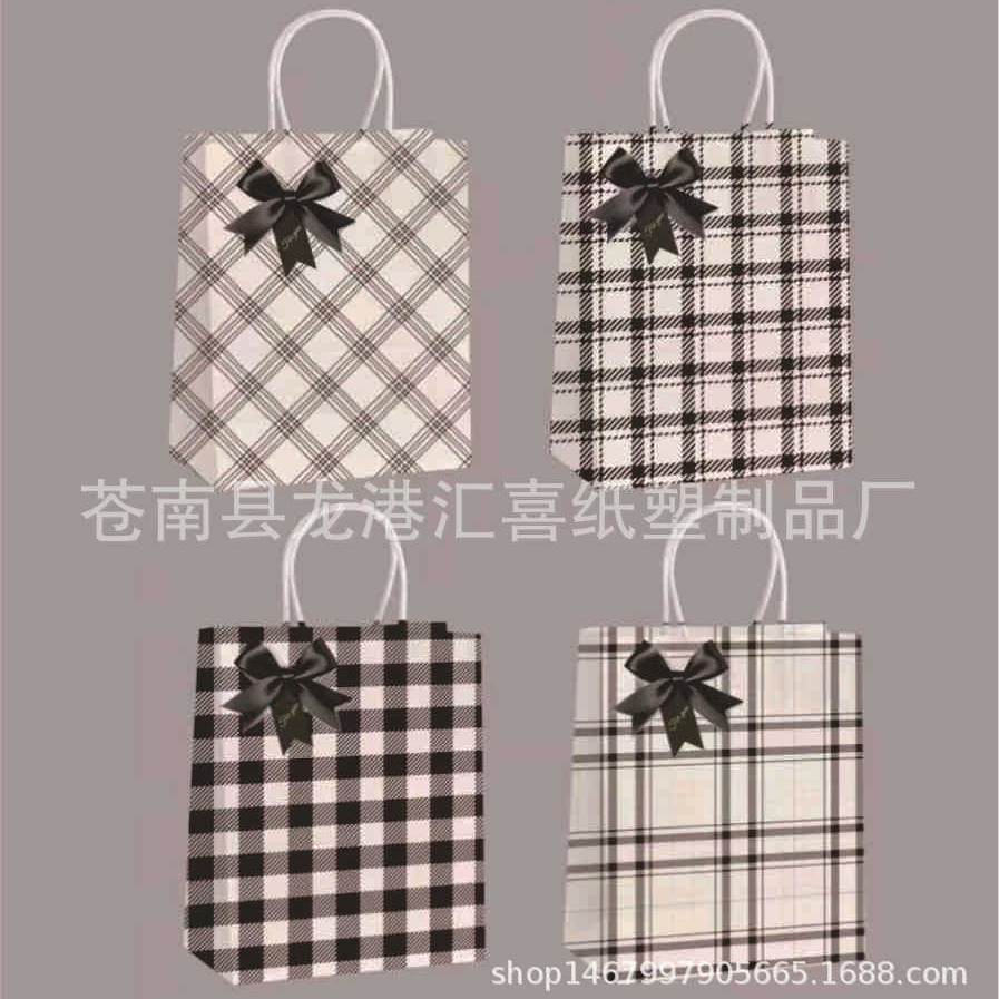 厂家供应蝴蝶结礼品包装袋 首饰袋牛皮纸袋手提袋 手提礼品袋现货